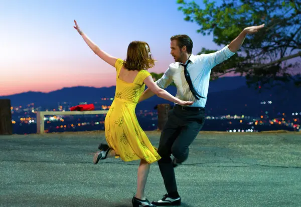 
"Iconic moment: Mia and Sebastian dance against the Los Angeles skyline in 'La La Land,' capturing the magic of dreams and love in the city of stars. ✨🎬 #LaLaLand #CityofStars #MovieMagic"